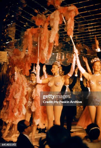 Las Vegas showgirls perform on stage during a show circa 1957 at the Las Vegas Club in Las Vegas, Nevada.