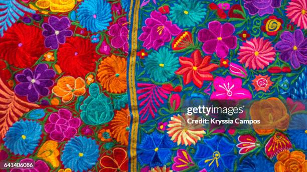 hand woven patterned tablecloths for sale at atitlan guatemala - embroidery stockfoto's en -beelden