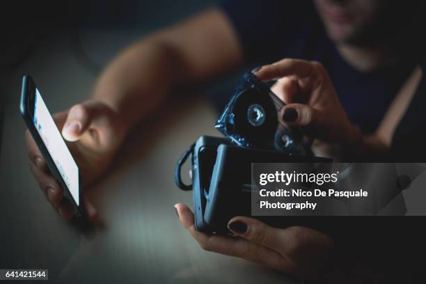 cassette player and smart phone - walkman stockfoto's en -beelden