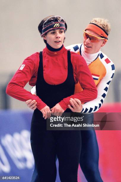 Franziska Schenk of Germany and Rintje Ritsma of the Netherlands talk during a practice session ahead of the Nagano Winter Olympic Games at Nagano...
