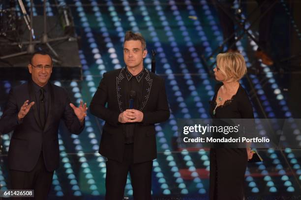 English singer Robbie Williams with Maria De Filippi and Carlo Conti at 67th Sanremo Music Festival. Sanremo , february 8, 2017