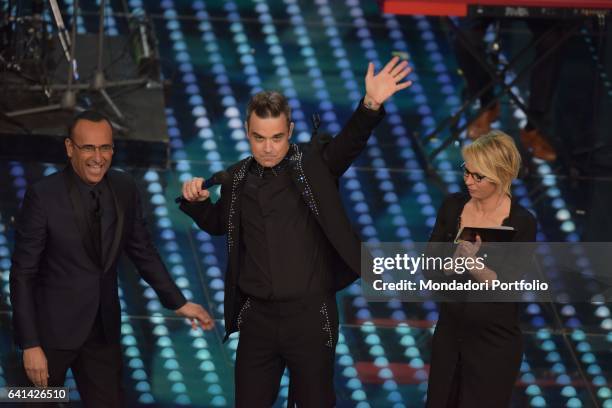 English singer Robbie Williams with Maria De Filippi and Carlo Conti at 67th Sanremo Music Festival. Sanremo , february 8, 2017