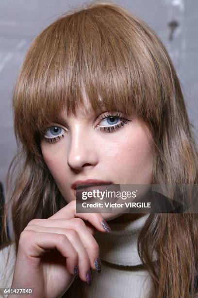 Model backstage at the Tadashi Shoji show during New York Fashion Week Fall Winter 2017-2018 on February 9, 2017 in New York City.