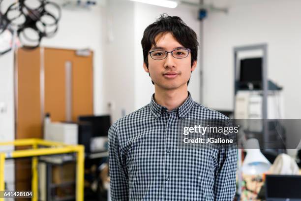 portrait of a confident engineering student - geeky stock pictures, royalty-free photos & images