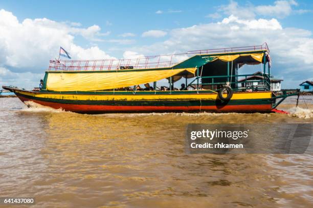 cambodia. siam reap. boat on tonle sap lake - chong kneas stock pictures, royalty-free photos & images