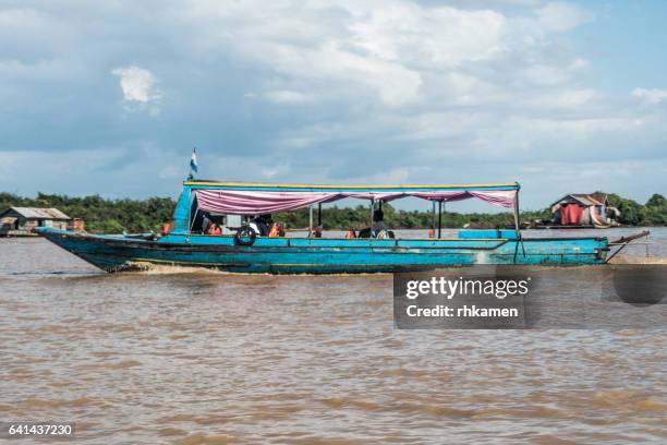 cambodia, siem reap. tour boat and floating villages on tonle sap lake - chong kneas stock pictures, royalty-free photos & images