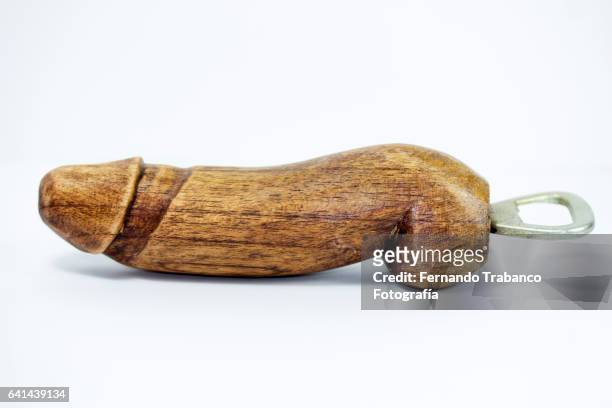 wooden bottle opener with penis shape - penis humour photos et images de collection