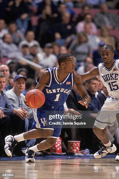 Cliff Hawkins of the Kentucky Wildcats dribbles the ball during the college basketball game against the Duke Blue Devils, part of the Jimmy V Classic...