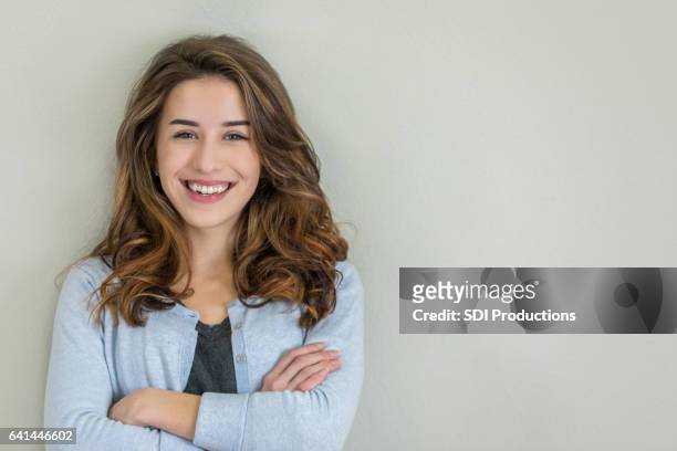 portrait of confident young caucasian woman - wavy hair stock pictures, royalty-free photos & images