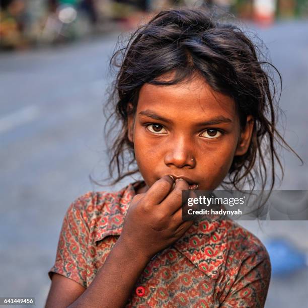poor indian girl asking for help - begging social issue stock pictures, royalty-free photos & images