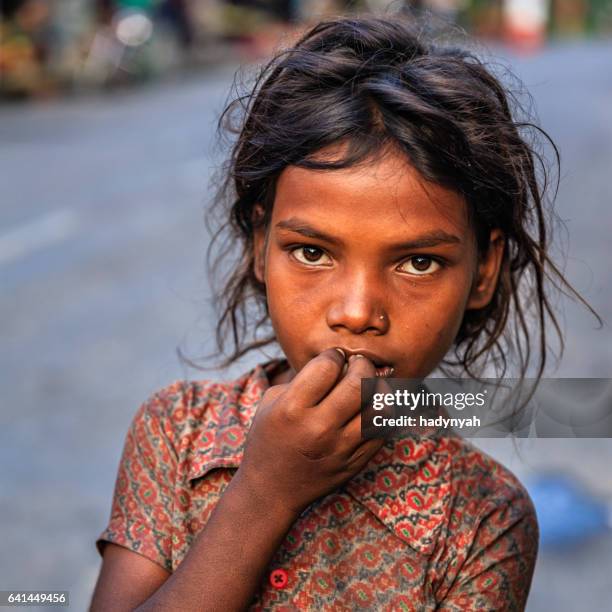 poor indian girl asking for help - nepal women stock pictures, royalty-free photos & images