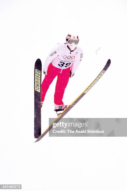 Takanobu Okabe of Japan soars during a practice of the Ski Jumping Individual Large Hill during day eight of the Nagano Winter Olympic Games at...