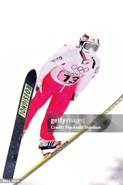 Takanobu Okabe of Japan competes in the second jump in the Ski Jumping Team during day ten of the Nagano Winter Olympic Games at Hakuba Ski Jumping...
