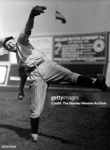Dazzy Vance, pitcher for the Brooklyn Dodgers, in a pitching stance, circa 1900.