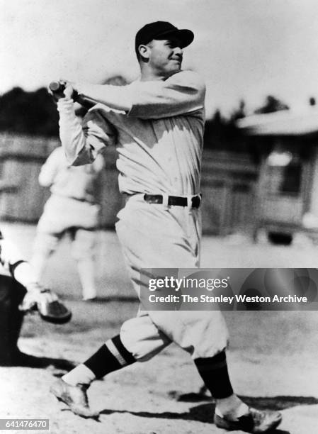 Henry E. Manush of the Washington Senators swinging a bat, circa 1930.