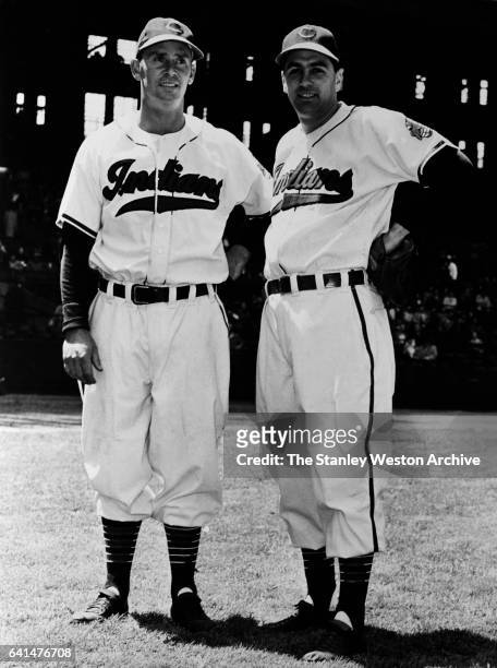 Joe Gordon, second baseman and Lou Boudreau, shortstop of the Cleveland Indians, pose for a portrait, circa 1947.