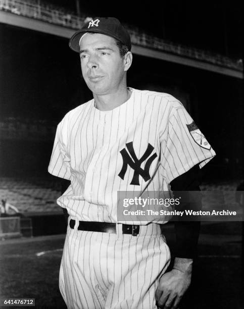 Joe DiMaggio, center fielder of the New York Yankees, poses for a portrait during his last year as a Yankee in 1951.