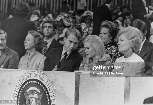 Pat Nixon, Edward F. Cox and Tricia Nixon Cox attending a meeting.