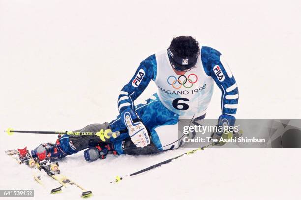 Alberto Tomba of Italy reacts after competing in the first run of the Alpine Skiing Men's Slalom during day fourteen of the Nagano Winter Olympic...