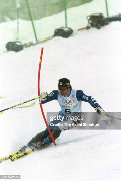 Alberto Tomba of Italy competes in the first run of the Alpine Skiing Men's Slalom during day fourteen of the Nagano Winter Olympic Games at Mt....