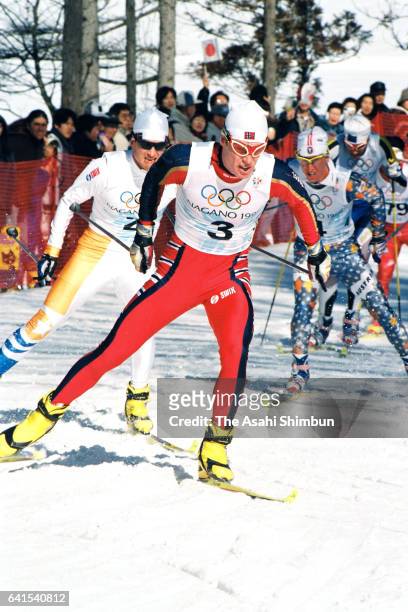 Bjorn Daehlie of Norway leads the pack in the Cross Country Skiing Men's 50km Freestyle during day fifteen of the Nagano Winter Olympic Games at Snow...