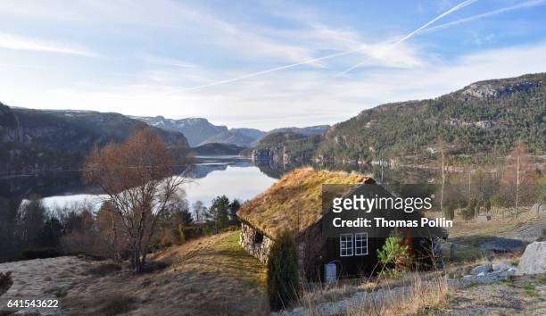 grass roof chalet and revsvatnet lake - chalet de montagne stock pictures, royalty-free photos & images