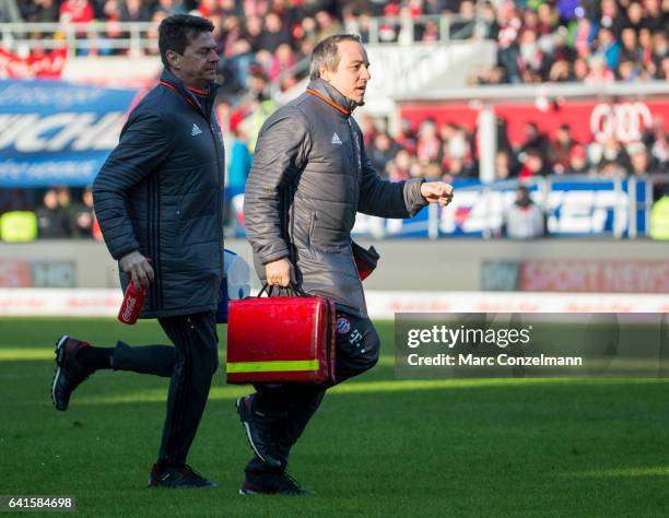 Dr. Volker Braun, Medical of Bayern Munich is seen during the Bundesliga match between FC Ingolstadt 04 and Bayern Muenchen at Audi Sportpark on...