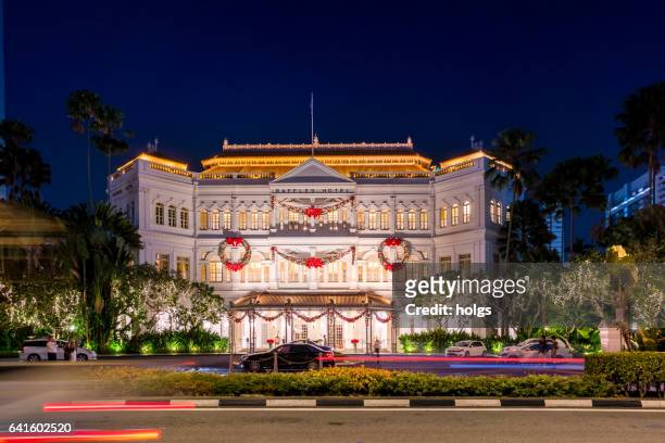 loterij hotel in singapore city in nacht - raffles hotel stockfoto's en -beelden