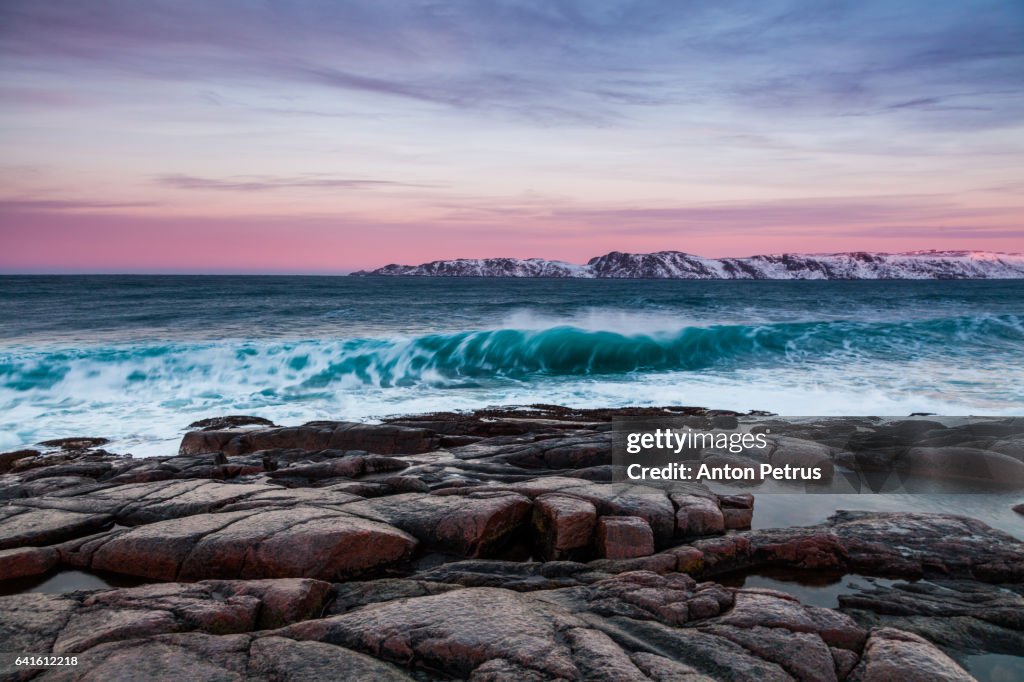 Stormy Barents Sea at sunset