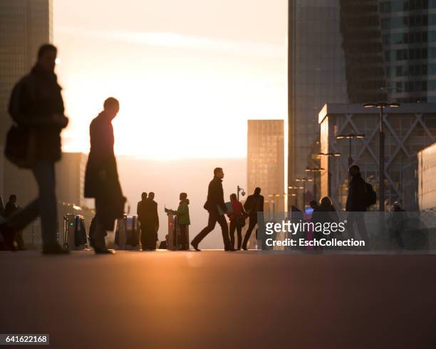 morning commute at business district of paris, france - work silhouette stockfoto's en -beelden