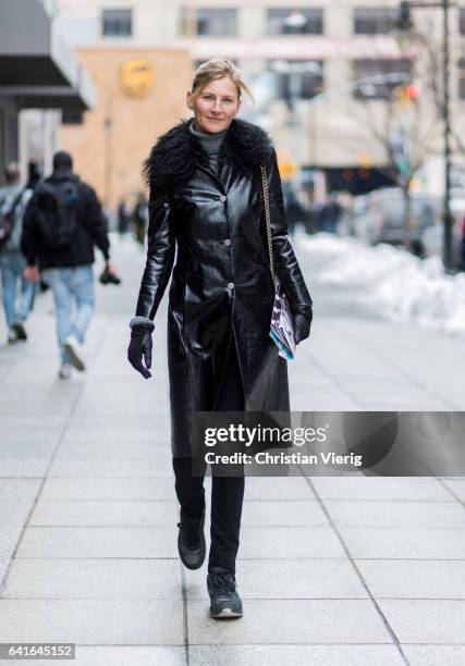 Elizabeth von Guttman wearing a black leather coat with fur collar outside Creatures of the Wind on February 11, 2017 in New York City.