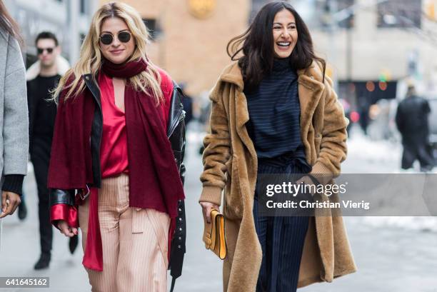 Nausheen Shah wearing a brown coat, clutch, striped pants, heels outside Creatures of the Wind on February 11, 2017 in New York City.