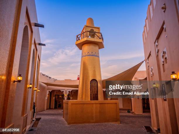 the golden mosque at katara cultural village, doha, qatar - qatar mosque stock pictures, royalty-free photos & images