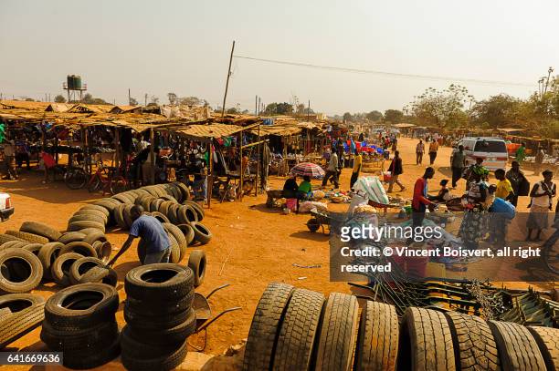 local used tire market, chipata, zambia - empilé stock pictures, royalty-free photos & images