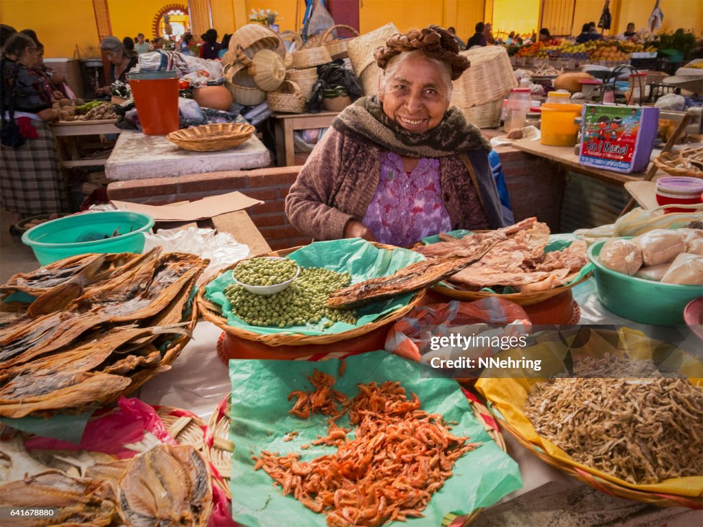 Zapotec woman selling dried seafood in market