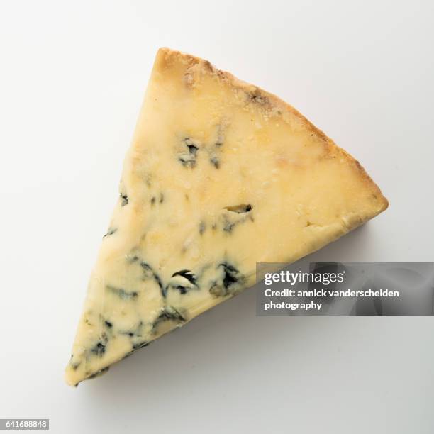 stilton cheese. - blue cheese crumble stock pictures, royalty-free photos & images
