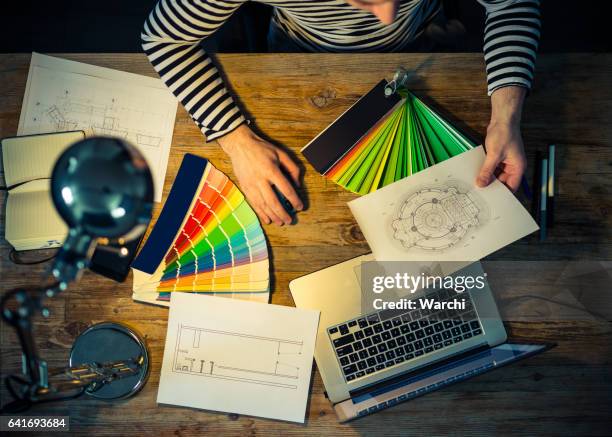 designer at work - editor stock pictures, royalty-free photos & images