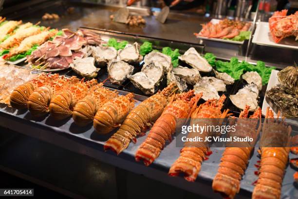 the grilled seafood of taiwan night market - kaohsiung stock pictures, royalty-free photos & images