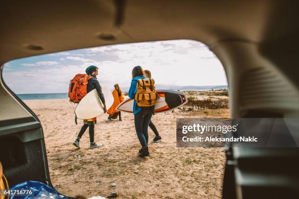 surfers on the road trip - sports equipment stock pictures, royalty-free photos & images