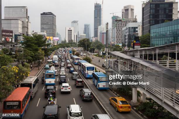 traffic jam in jakarta crowded street in indonesia - 新興国 ストックフォトと画像