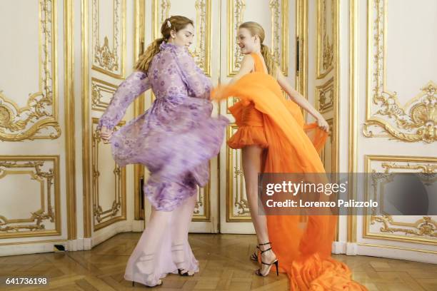 Models Teddy Quinlivan and Roos Abels pose Backstage prior the Giambattista Valli Spring Summer 2017 show as part of Paris Fashion Week on January...