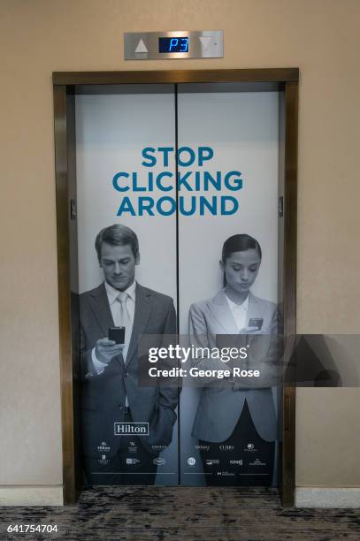 Elevator doors at the Hilton Universal Hotel, located adjacent to Universal Studios Hollywood, feature siggestive advertising as viewed on February...