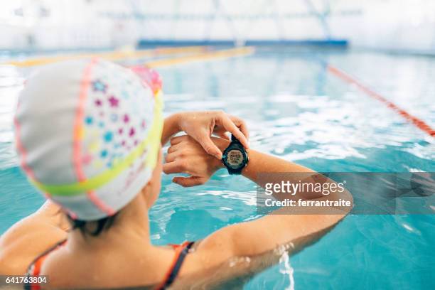 swimming lap counter watch - pedometer stock pictures, royalty-free photos & images