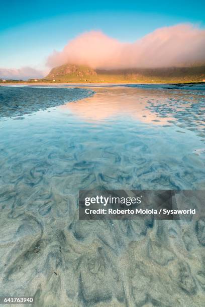 pink lights of midnight sun fredvang norway - midnight sun norway ストックフォトと画像