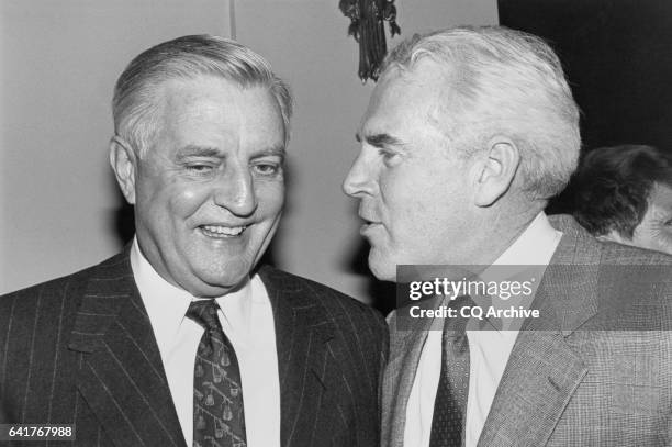 Former Vice President Walter Mondale and Rep. Victor Herbert Fazio, D-Calif., House Democratic Caucus Vice Chairman, talking with each other at the...