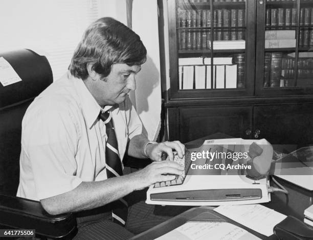 Rep. Charles Grandison "Charlie" Rose III, D-N.C., House of Representatives Member, on his computer.