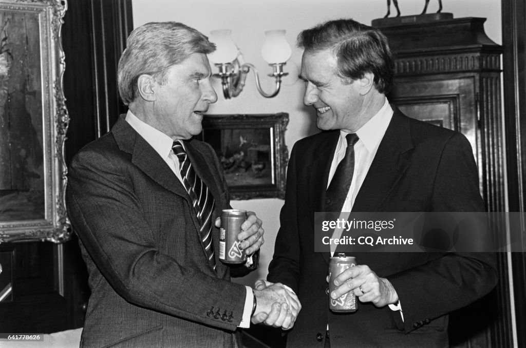 Senator John Warner with senator Donald W. Riegle Jr.