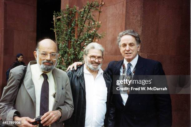 Portrait of, from left, American poets Allen Ginsberg and Gregory Corso , with musician, composer, and conductor David Amram outside the Elmer Holmes...