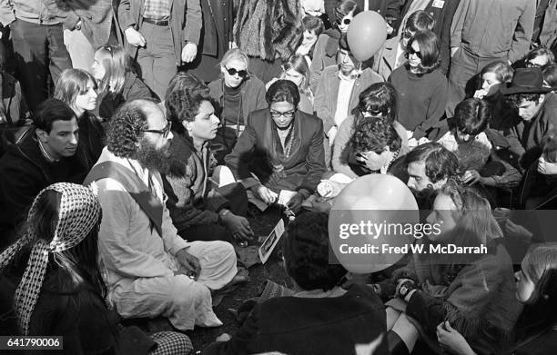At the 'Easter Be-In' on Central Park's Sheep Meadow, American poet Allen Ginsberg and Gregory Corso face one another, New York, New York, March 26,...