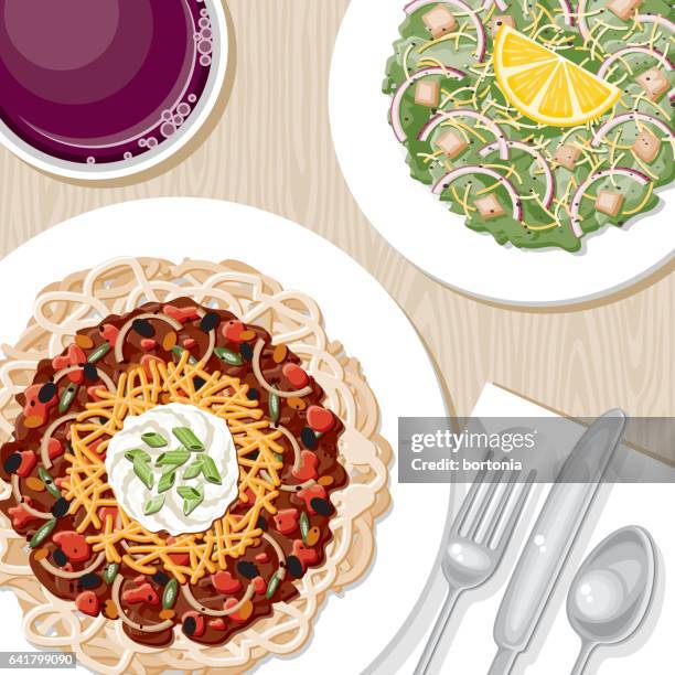 overhead view of a dinner table - caesar salad stock illustrations